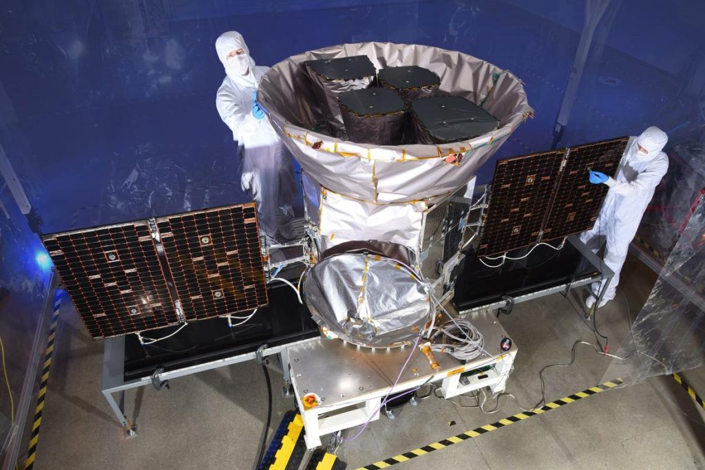 The TESS satellite shown in final assembly at Orbital ATK (courtesy of NASA)